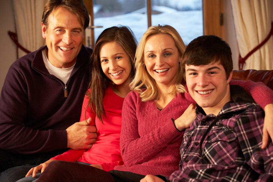 bigstock-Portrait-Of-Family-Relaxing-On-38779417