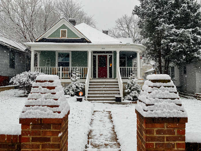 A suburban house in a Northern Virginia neighborhood that is covered with snow in the wintertime. 