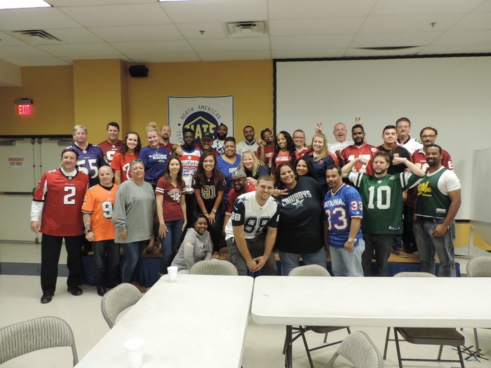 Group photo of the hardworking and talented CroppMetcalfe employees at a company event.  